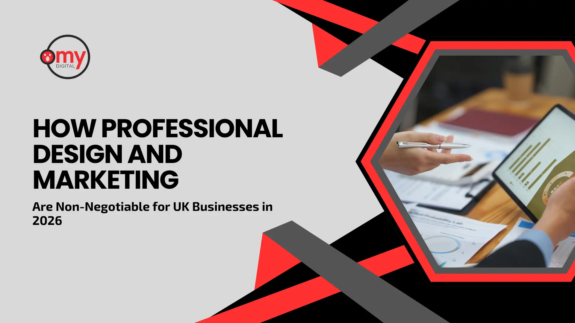 A digital blog and guide banner by Omy Digital with a light gray background accented by dynamic red, dark gray, and black angular geometric shapes. On the left side, the official Omy Digital logo sits above prominent black headline typography reading "HOW PROFESSIONAL DESIGN AND MARKETING" followed by the subtitle "Are Non-Negotiable for Canadian Businesses in 2026". On the right side, framed inside a large black and bright red hexagonal shape, a stock photo depicts two corporate professionals collaborating over a wooden table, with one person holding a silver pen near printed charts and financial documents while the other holds a digital tablet displaying colorful bar charts and analytics data.